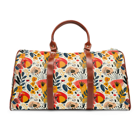 a floral print duffel bag with brown straps
