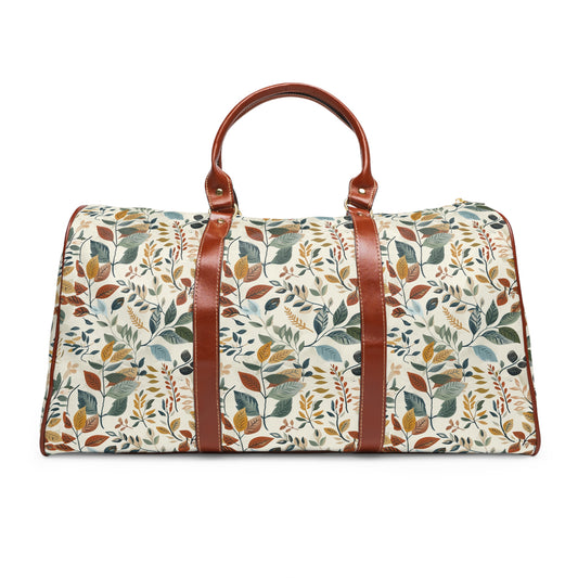 a floral print duffel bag on a white background